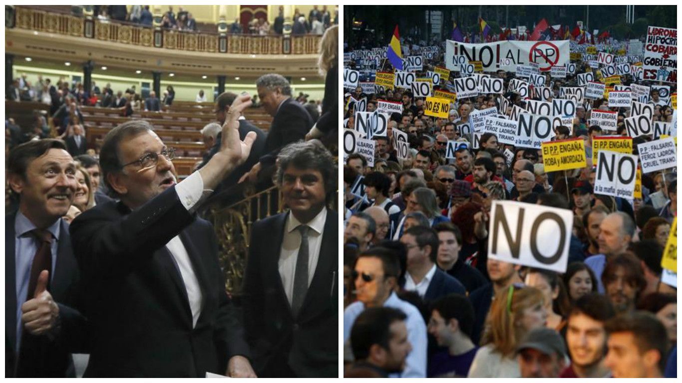 Rajoy saluda a su bancada y la manifestación de rodea el Congreso